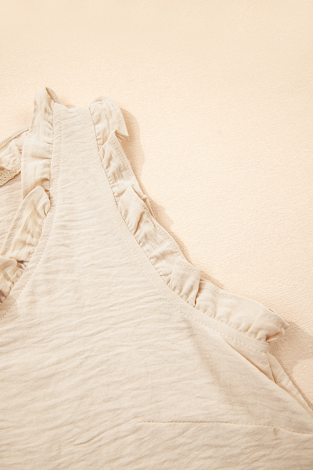Parchment Textured Frilly Trim V Neck Sleeveless Top